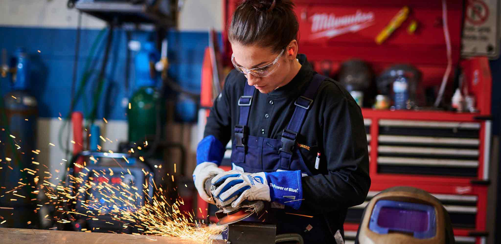 A female welder working for the City of Richmond